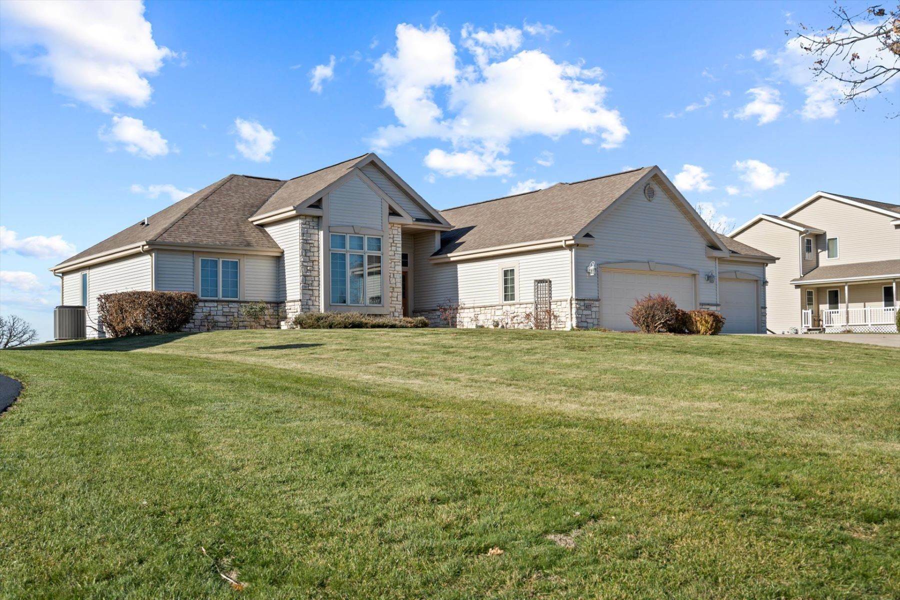 Single Family Homes for Sale at Spacious Juneau Ranch 417 N Fairfield Ave. Juneau, Wisconsin 53039 United States